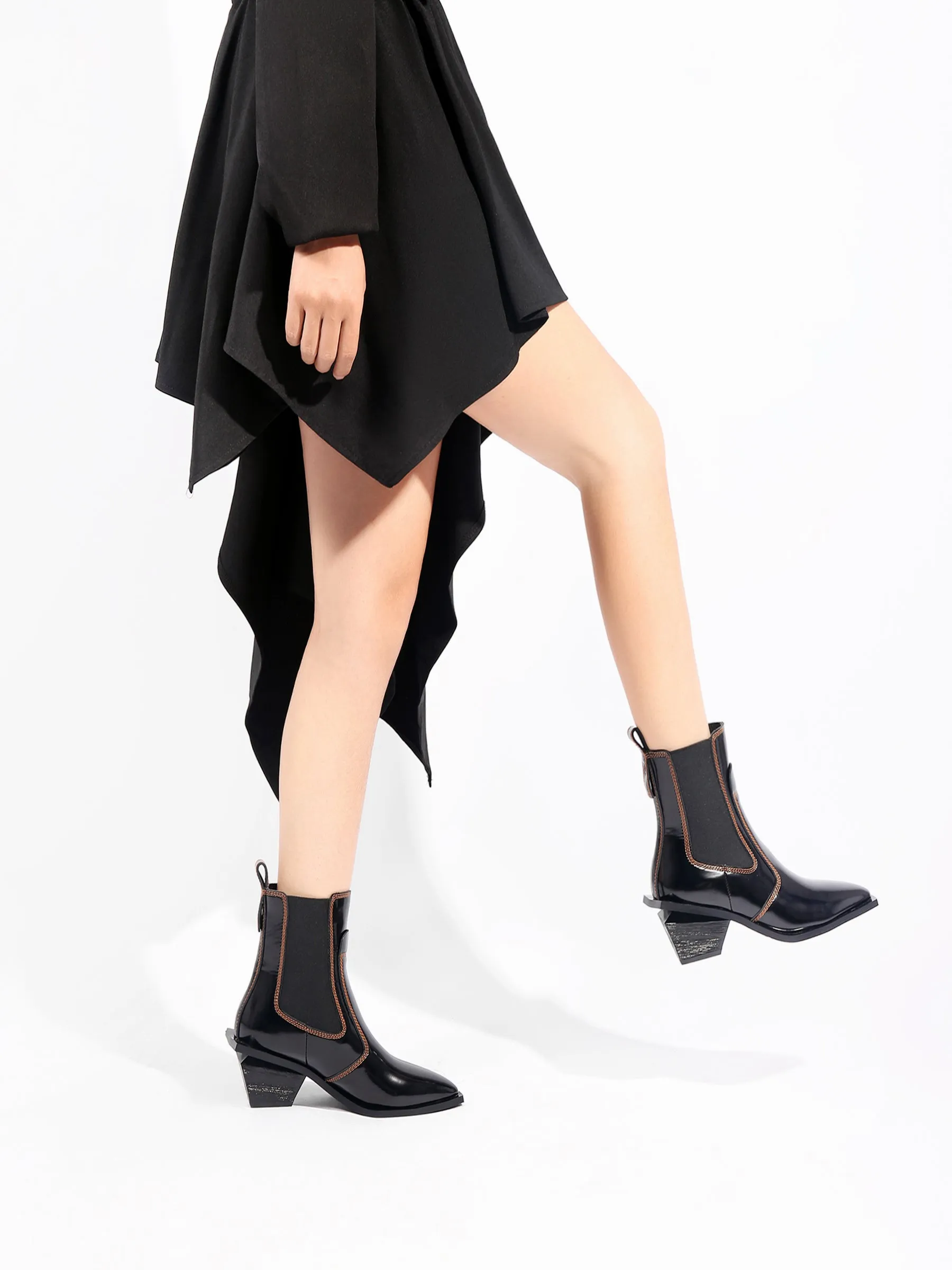 Sharp Toe Black Leather Chelsea Bootie