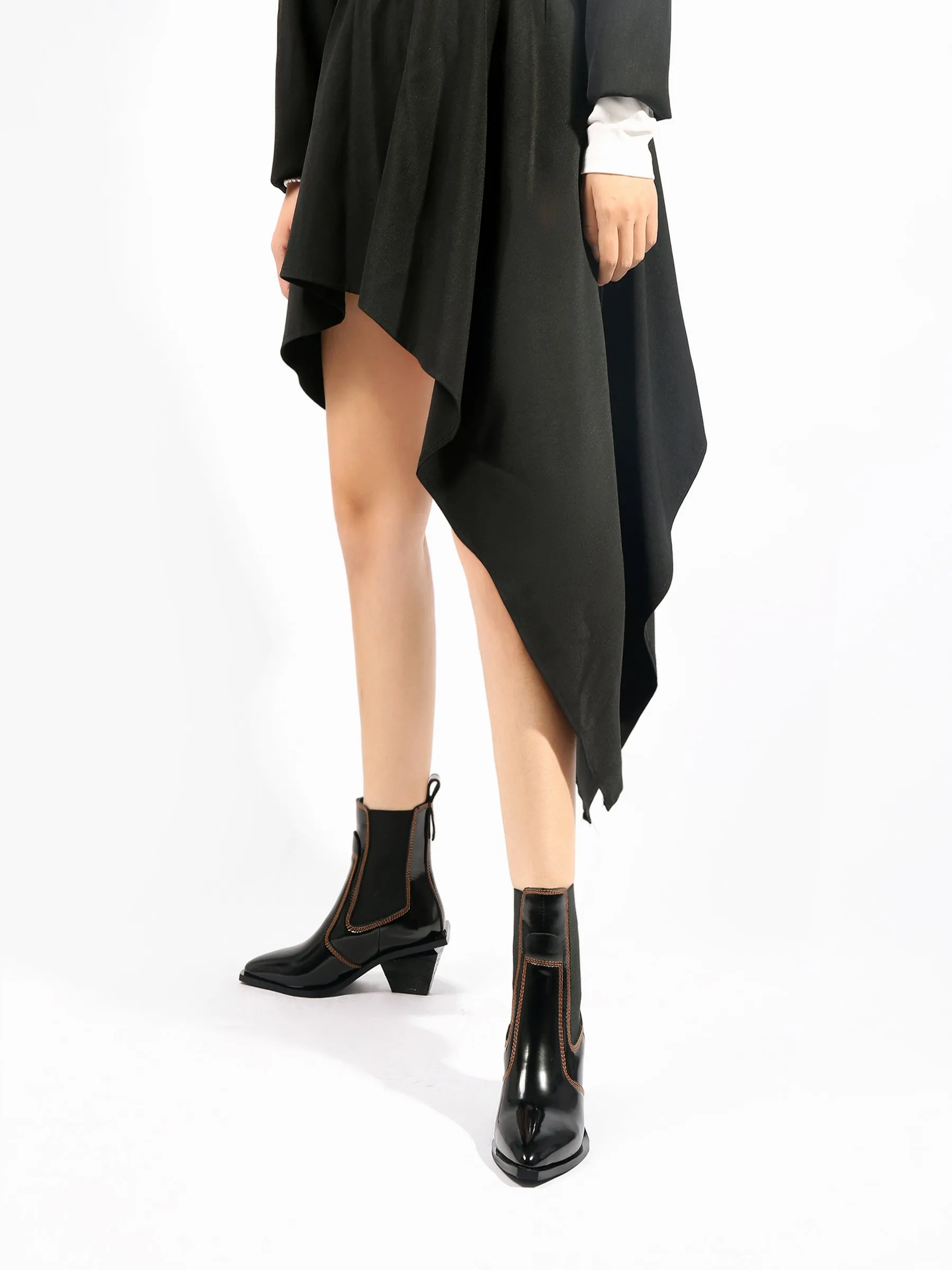 Sharp Toe Black Leather Chelsea Bootie